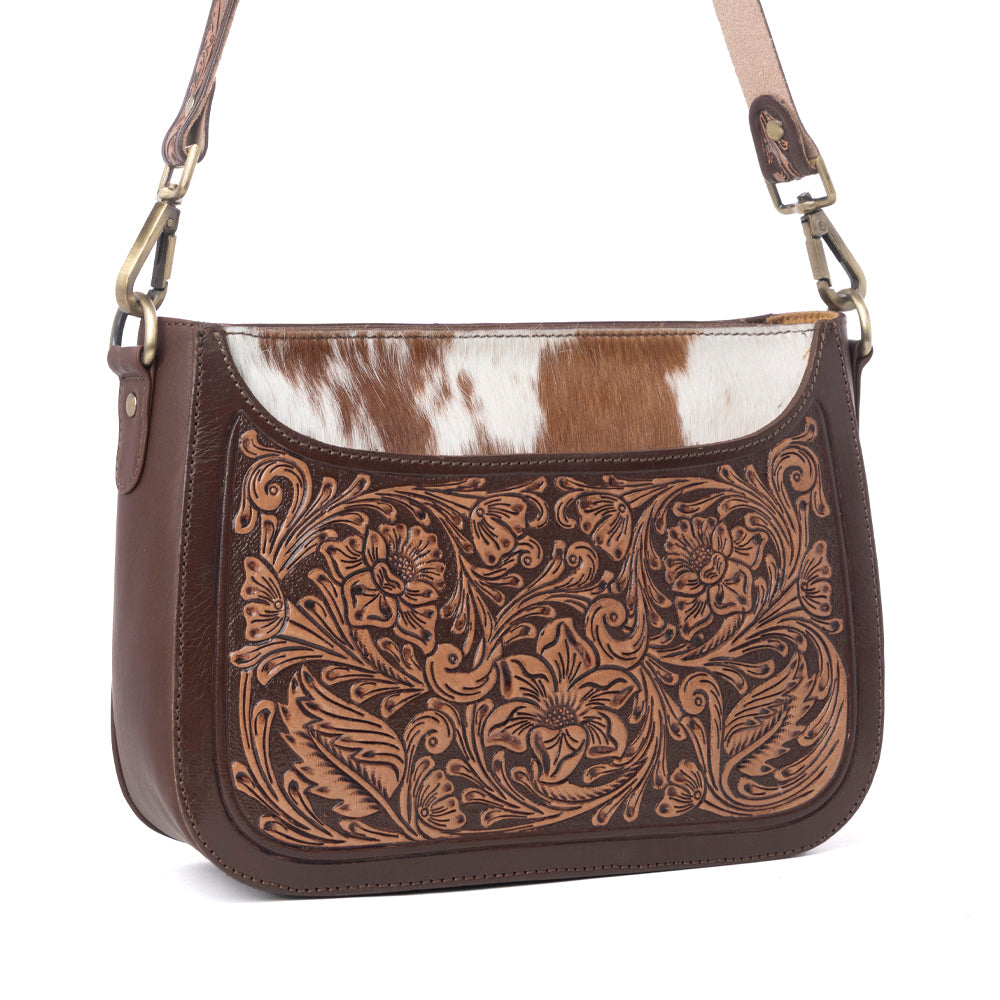 Myra Copper Crest Handtooled Hairon Leather Clutch in Saddle Walnut